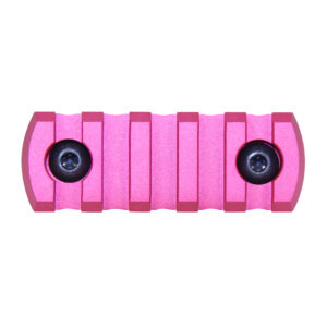 Anodized pink 2.25 inch M-LOK accessory rail with black mounting screws